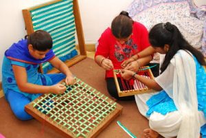 Basic craft work like sewing, basket making, envelope making and handicraft work training program at Mitra Jyothi.